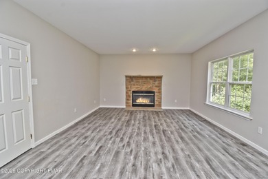 COMPLETELY RENOVATED & MOVE-IN READY! This STUNNING 4bd/2.5ba on Country Club of the Poconos Golf Course in Pennsylvania - for sale on GolfHomes.com, golf home, golf lot