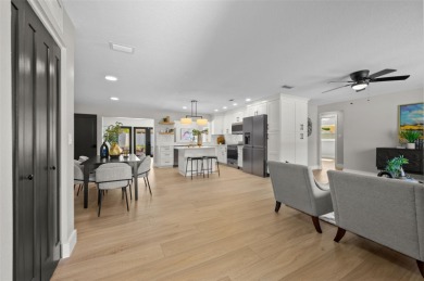 Welcome to this beautifully remodeled 3 bedroom, 2 bathroom pool on Mangrove Bay Golf Course in Florida - for sale on GolfHomes.com, golf home, golf lot
