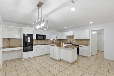 CLEAN AND MOVE IN READY. Situated on a quiet, established street on Shady Valley Golf Club in Texas - for sale on GolfHomes.com, golf home, golf lot