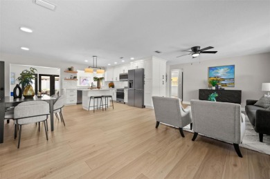 Welcome to this beautifully remodeled 3 bedroom, 2 bathroom pool on Mangrove Bay Golf Course in Florida - for sale on GolfHomes.com, golf home, golf lot