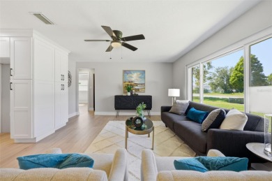 Welcome to this beautifully remodeled 3 bedroom, 2 bathroom pool on Mangrove Bay Golf Course in Florida - for sale on GolfHomes.com, golf home, golf lot