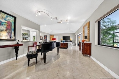 Located within the 24-hour manned, gated Evergreen Club, this on Evergreen Club in Florida - for sale on GolfHomes.com, golf home, golf lot