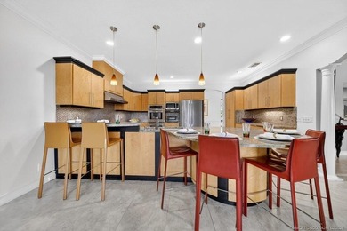 Located within the 24-hour manned, gated Evergreen Club, this on Evergreen Club in Florida - for sale on GolfHomes.com, golf home, golf lot