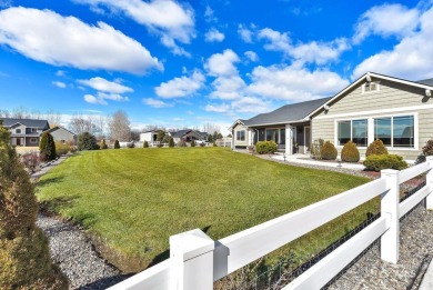 This stunning property offers an 18-ft garage door with an RV on River Bend Golf Course in Idaho - for sale on GolfHomes.com, golf home, golf lot