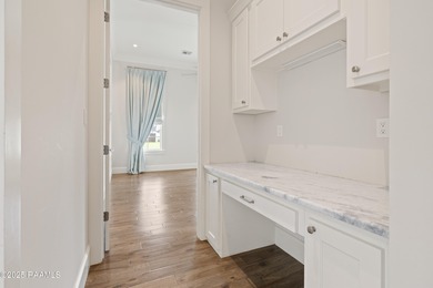 Charming 5-Bedroom Acadian-Style Home with Park Views in Sugar on Les Vieux Chenes Golf Course in Louisiana - for sale on GolfHomes.com, golf home, golf lot