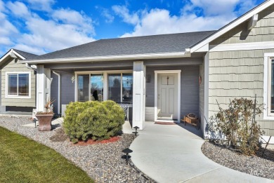 This stunning property offers an 18-ft garage door with an RV on River Bend Golf Course in Idaho - for sale on GolfHomes.com, golf home, golf lot