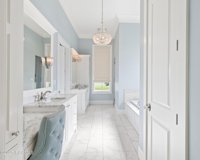 Charming 5-Bedroom Acadian-Style Home with Park Views in Sugar on Les Vieux Chenes Golf Course in Louisiana - for sale on GolfHomes.com, golf home, golf lot