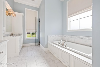 Charming 5-Bedroom Acadian-Style Home with Park Views in Sugar on Les Vieux Chenes Golf Course in Louisiana - for sale on GolfHomes.com, golf home, golf lot