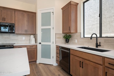 This brand-new townhome in Residential Estates bordering the on London Bridge Golf Course in Arizona - for sale on GolfHomes.com, golf home, golf lot