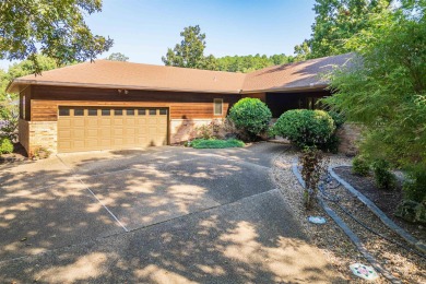 Charming 3-bedroom, 2.5-bath home on a corner lot overlooking on Balboa Golf Course in Arkansas - for sale on GolfHomes.com, golf home, golf lot