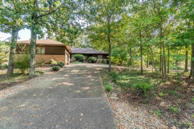 Charming 3-bedroom, 2.5-bath home on a corner lot overlooking on Balboa Golf Course in Arkansas - for sale on GolfHomes.com, golf home, golf lot