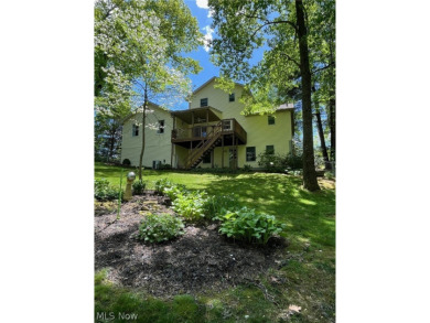 Custom built, quality, two- owner home nestled on wooded lot on Lake Mohawk Golf Club in Ohio - for sale on GolfHomes.com, golf home, golf lot