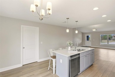 Welcome to brand-new construction in the sought-after Sun 'n on Sun n Lake Golf and Country Club in Florida - for sale on GolfHomes.com, golf home, golf lot