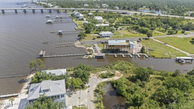 Come build your dream home on this large waterfront lot near on Pass Christian Isles Golf Club in Mississippi - for sale on GolfHomes.com, golf home, golf lot