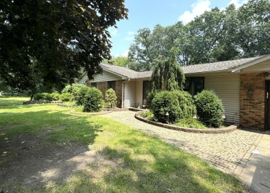 This stunning 1.86-acre property on The Grande Golf course on Grande Golf Club in Michigan - for sale on GolfHomes.com, golf home, golf lot