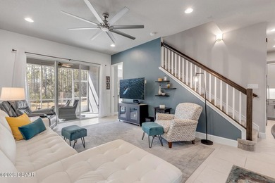 Experience modern Florida living in this stunning two-story home on Plantation Bay Golf and Country Club in Florida - for sale on GolfHomes.com, golf home, golf lot