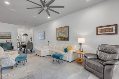 Experience modern Florida living in this stunning two-story home on Plantation Bay Golf and Country Club in Florida - for sale on GolfHomes.com, golf home, golf lot