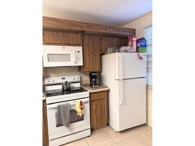 Spacious Condo, Clubhouse, Fitness Center, Manager on Site, Pool on Bear Lakes Country Club in Florida - for sale on GolfHomes.com, golf home, golf lot