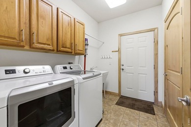 Nestled on a quiet cul-de-sac corner lot, this beautifully on Highland Meadows Golf Course in Colorado - for sale on GolfHomes.com, golf home, golf lot