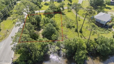 Come build your dream home on this large waterfront lot near on Pass Christian Isles Golf Club in Mississippi - for sale on GolfHomes.com, golf home, golf lot