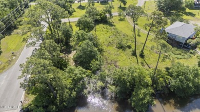 Come build your dream home on this large waterfront lot near on Pass Christian Isles Golf Club in Mississippi - for sale on GolfHomes.com, golf home, golf lot