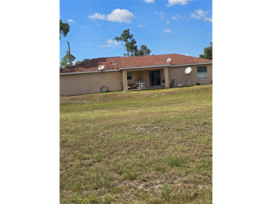 NO HOA , everyone qualifies This house backs up to a canal and on Mirror Lakes Golf Club in Florida - for sale on GolfHomes.com, golf home, golf lot