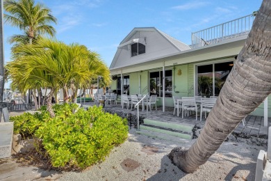 Experience the ultimate in Florida Keys living with this coveted on Key Colony Beach Golf Course in Florida - for sale on GolfHomes.com, golf home, golf lot