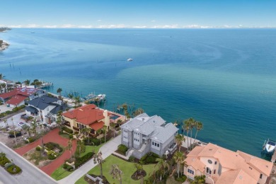 Experience the epitome of coastal elegance in this stunning on Key Royale Club in Florida - for sale on GolfHomes.com, golf home, golf lot