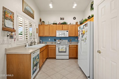 Welcome to this beautifully maintained 2 bedroom, 2 bath + Den on Lone Tree Golf Club in Arizona - for sale on GolfHomes.com, golf home, golf lot
