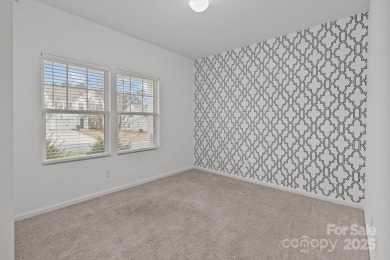 Highly desirable floor plan with the primary suite and two on The Tillery Tradition Country Club in North Carolina - for sale on GolfHomes.com, golf home, golf lot