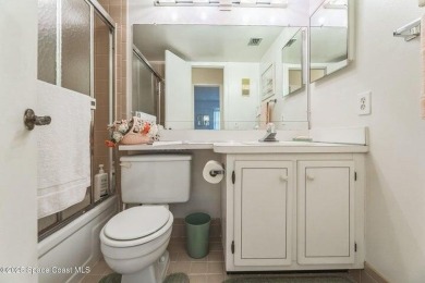 Wake up to lake and golf course views from this bright and on  in Florida - for sale on GolfHomes.com, golf home, golf lot