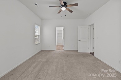 Highly desirable floor plan with the primary suite and two on The Tillery Tradition Country Club in North Carolina - for sale on GolfHomes.com, golf home, golf lot