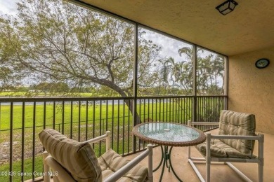 Wake up to lake and golf course views from this bright and on  in Florida - for sale on GolfHomes.com, golf home, golf lot