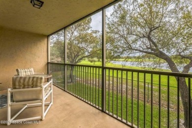 Wake up to lake and golf course views from this bright and on  in Florida - for sale on GolfHomes.com, golf home, golf lot