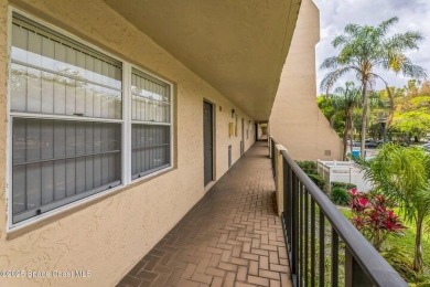 Wake up to lake and golf course views from this bright and on  in Florida - for sale on GolfHomes.com, golf home, golf lot