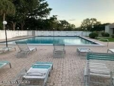 Wake up to lake and golf course views from this bright and on  in Florida - for sale on GolfHomes.com, golf home, golf lot