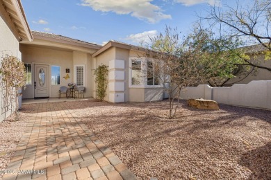 Resort style living, morning coffee on the back patio enjoying on Verde Santa Fe Golf Club in Arizona - for sale on GolfHomes.com, golf home, golf lot