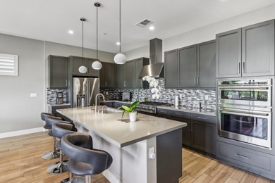 Step into the epitome of refined desert living with this on Plantation Golf Club in California - for sale on GolfHomes.com, golf home, golf lot