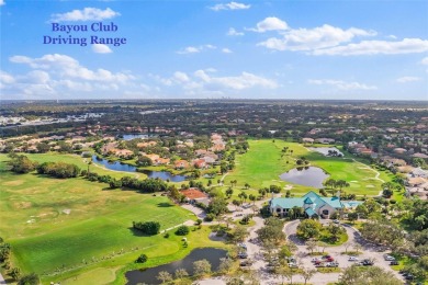 Under contract-accepting backup offers. Live in style in this on Bayou Golf Club in Florida - for sale on GolfHomes.com, golf home, golf lot