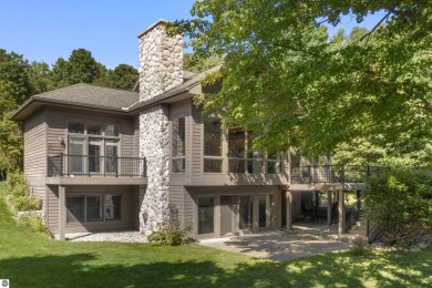 Custom-designed cedar home on over 7.5 acres with 600' of on Bear Lake Highlands Golf Course in Michigan - for sale on GolfHomes.com, golf home, golf lot