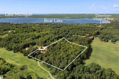 Custom-designed cedar home on over 7.5 acres with 600' of on Bear Lake Highlands Golf Course in Michigan - for sale on GolfHomes.com, golf home, golf lot