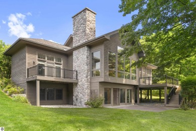 Custom-designed cedar home on over 7.5 acres with 600' of on Bear Lake Highlands Golf Course in Michigan - for sale on GolfHomes.com, golf home, golf lot