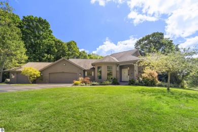 Custom-designed cedar home on over 7.5 acres with 600' of on Bear Lake Highlands Golf Course in Michigan - for sale on GolfHomes.com, golf home, golf lot