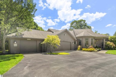 Custom-designed cedar home on over 7.5 acres with 600' of on Bear Lake Highlands Golf Course in Michigan - for sale on GolfHomes.com, golf home, golf lot