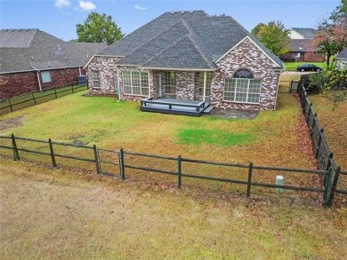 Upon walking into this wonderful home you are greeted with an on Bailey Ranch Golf Club in Oklahoma - for sale on GolfHomes.com, golf home, golf lot