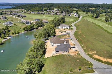 Discover the perfect lakefront retreat with this stunning on Wind River Golf Course in Tennessee - for sale on GolfHomes.com, golf home, golf lot