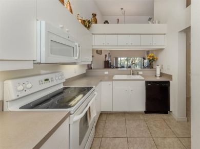 Beautiful Waterside Village condo with wonderful water and on Pelican Pointe Golf and Country Club in Florida - for sale on GolfHomes.com, golf home, golf lot