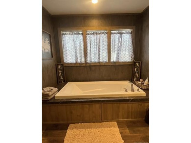 Fully furnished home with hot tub and READY-TO-MOVE-IN located on Arrowhead State Park Golf Course in Oklahoma - for sale on GolfHomes.com, golf home, golf lot