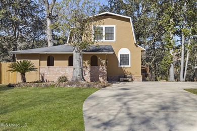 Looking for a coastal escape? This waterfront home is ideal as a on Mississippi National Golf Course in Mississippi - for sale on GolfHomes.com, golf home, golf lot