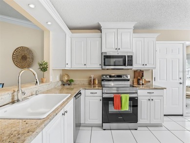 DESIGNER HOME, WATER FRONT!! NO BOND & FANTASTIC WATER on El Diablo Executive Golf Course in Florida - for sale on GolfHomes.com, golf home, golf lot